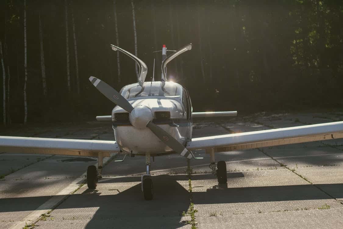 General aviation aircraft parked at FBO tarmac — annual inspection and ownership costs for GA pilots