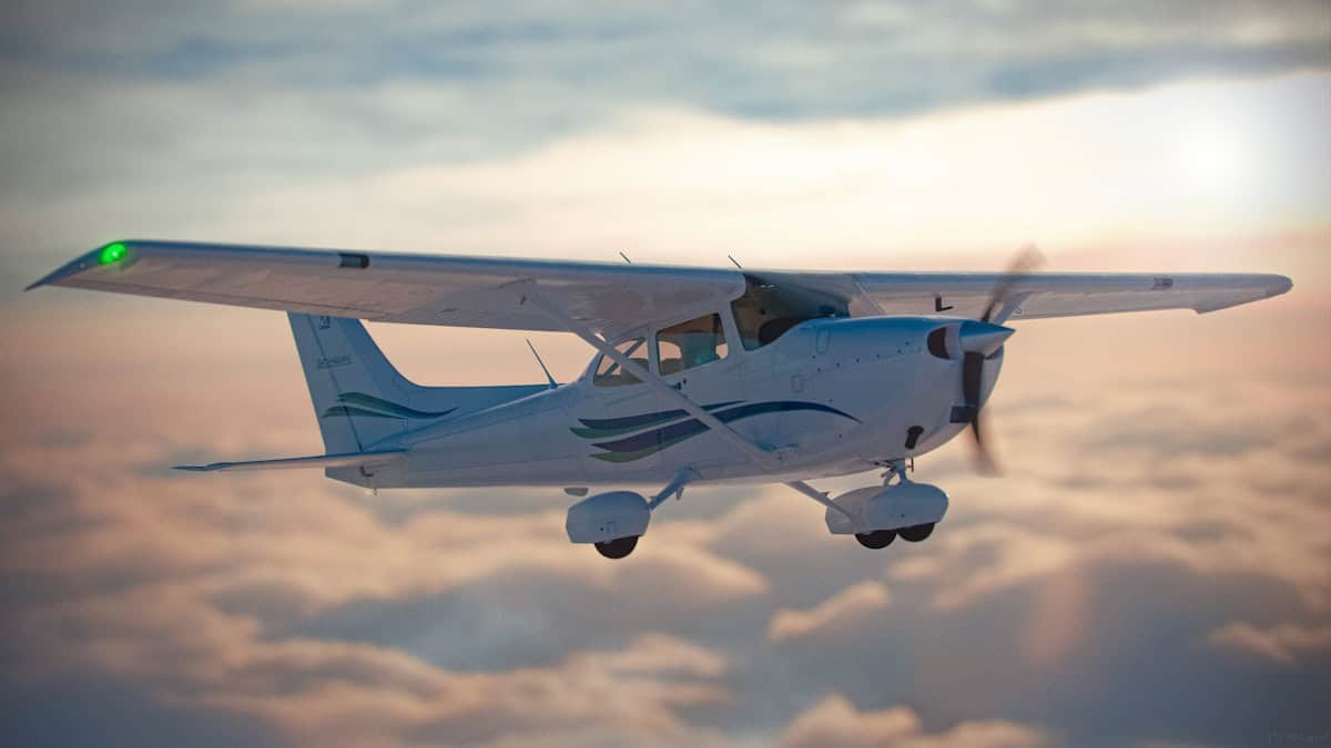 An aircraft flying through the sky during sunset, showcasing sleek design and smooth flight.