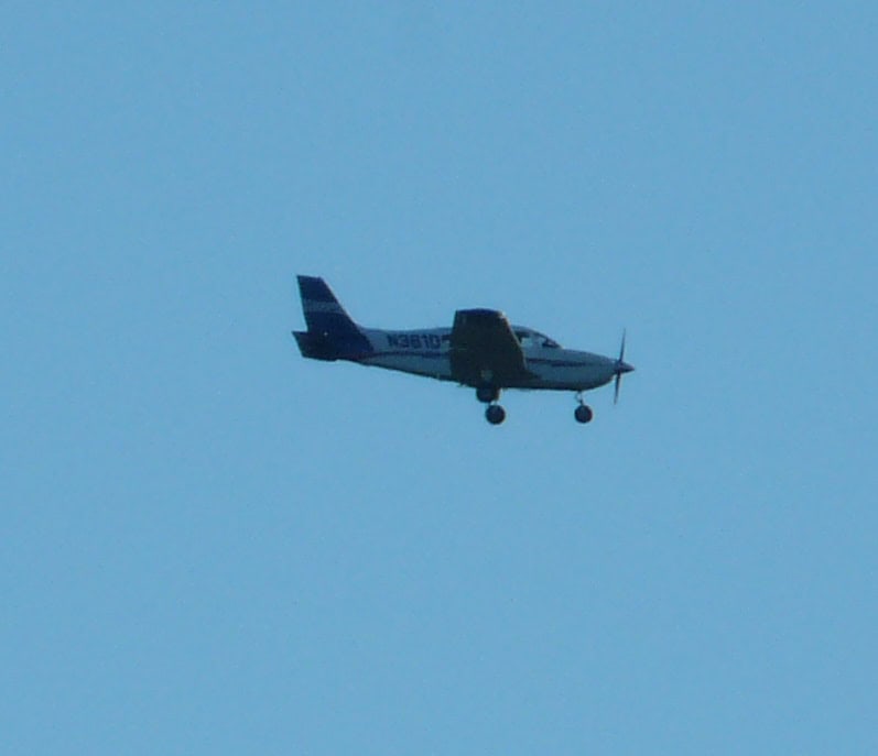 Cessna 172 in flight blue sky private pilot checkride maneuvers