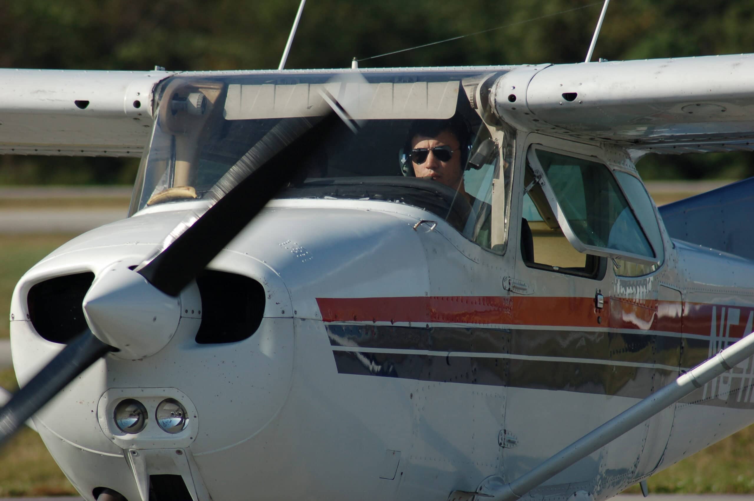Jacksonville University flight team Cessna 172 at small airport