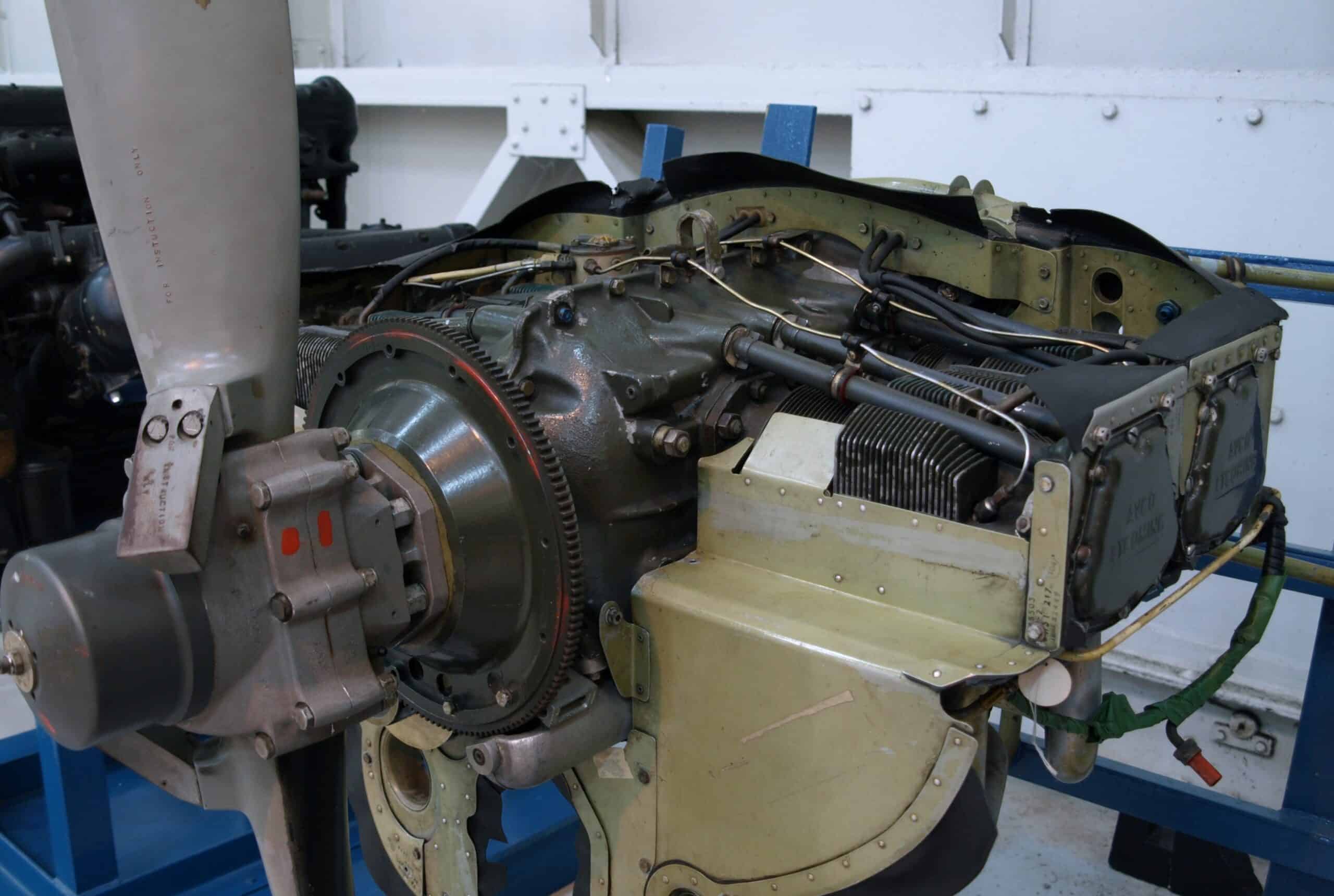 Lycoming IO-360 fuel-injected piston engine showing exhaust ports for EGT probe installation