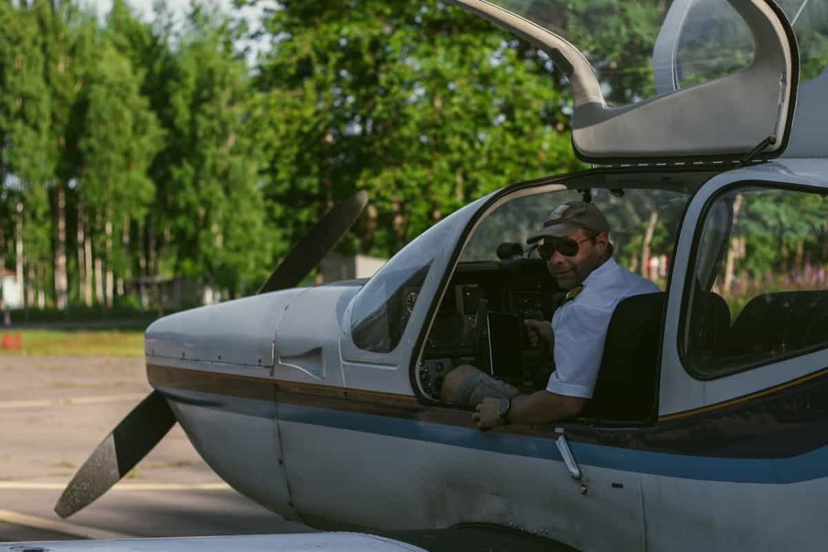 GA pilot health — pilot sitting and flying small general aviation airplane