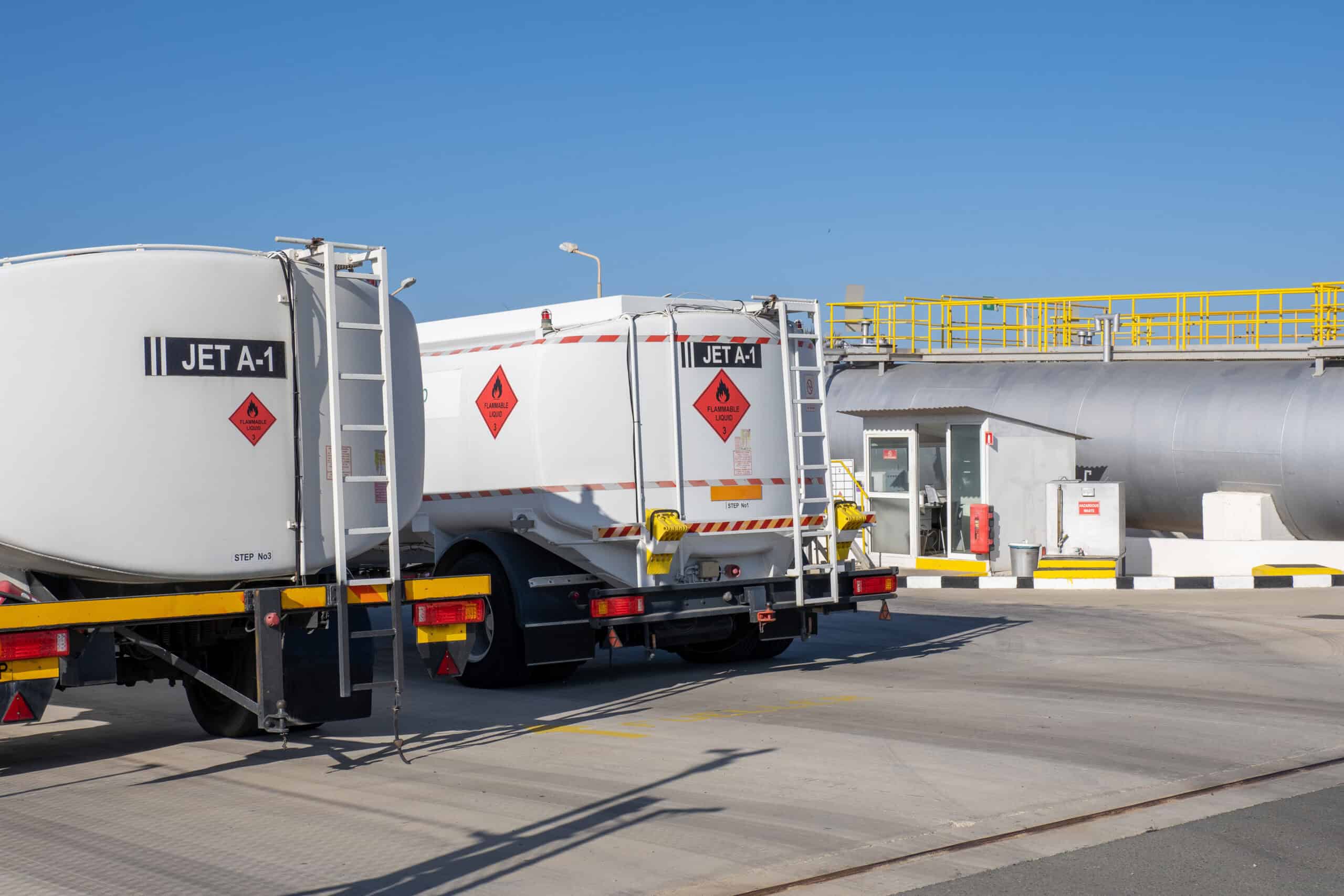 JET A-1 fuel tanks at an airport fueling station.