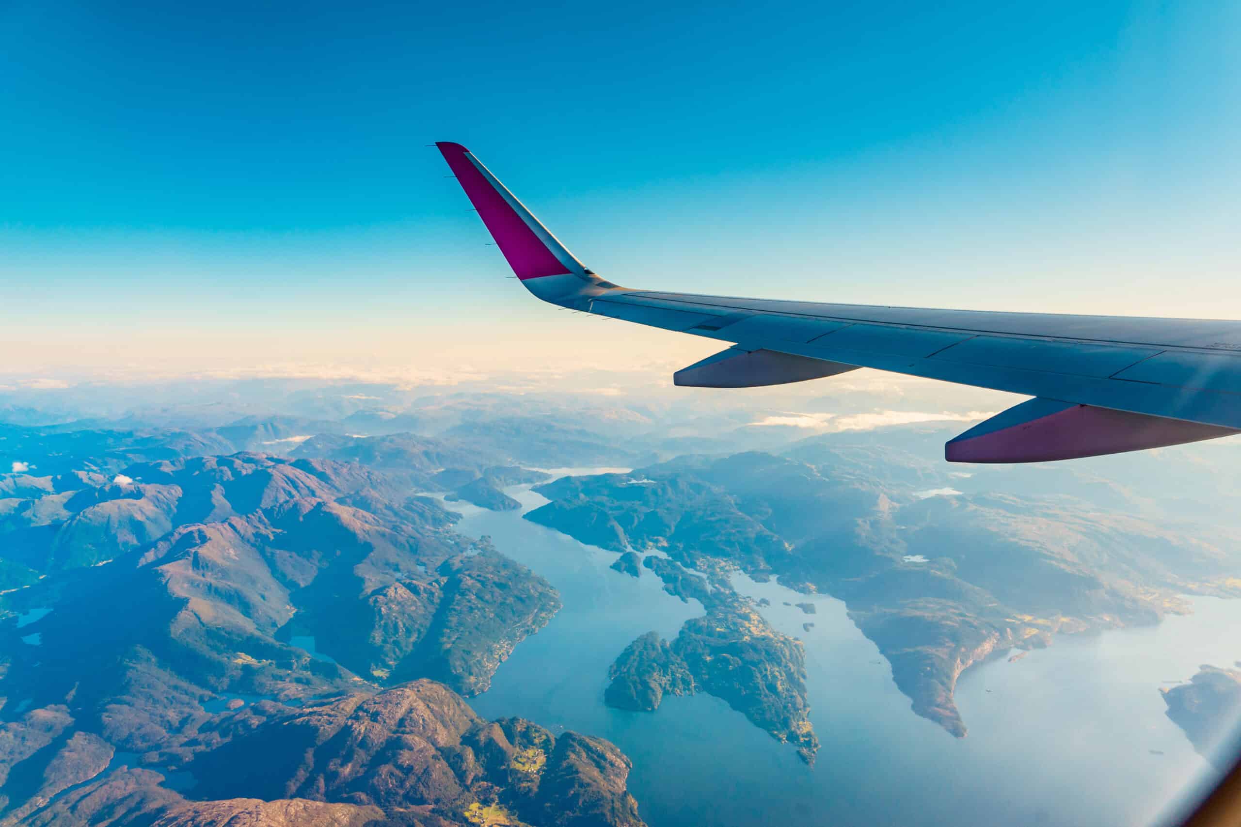 Aerial view from small aircraft wing showing aircraft camera mount perspective