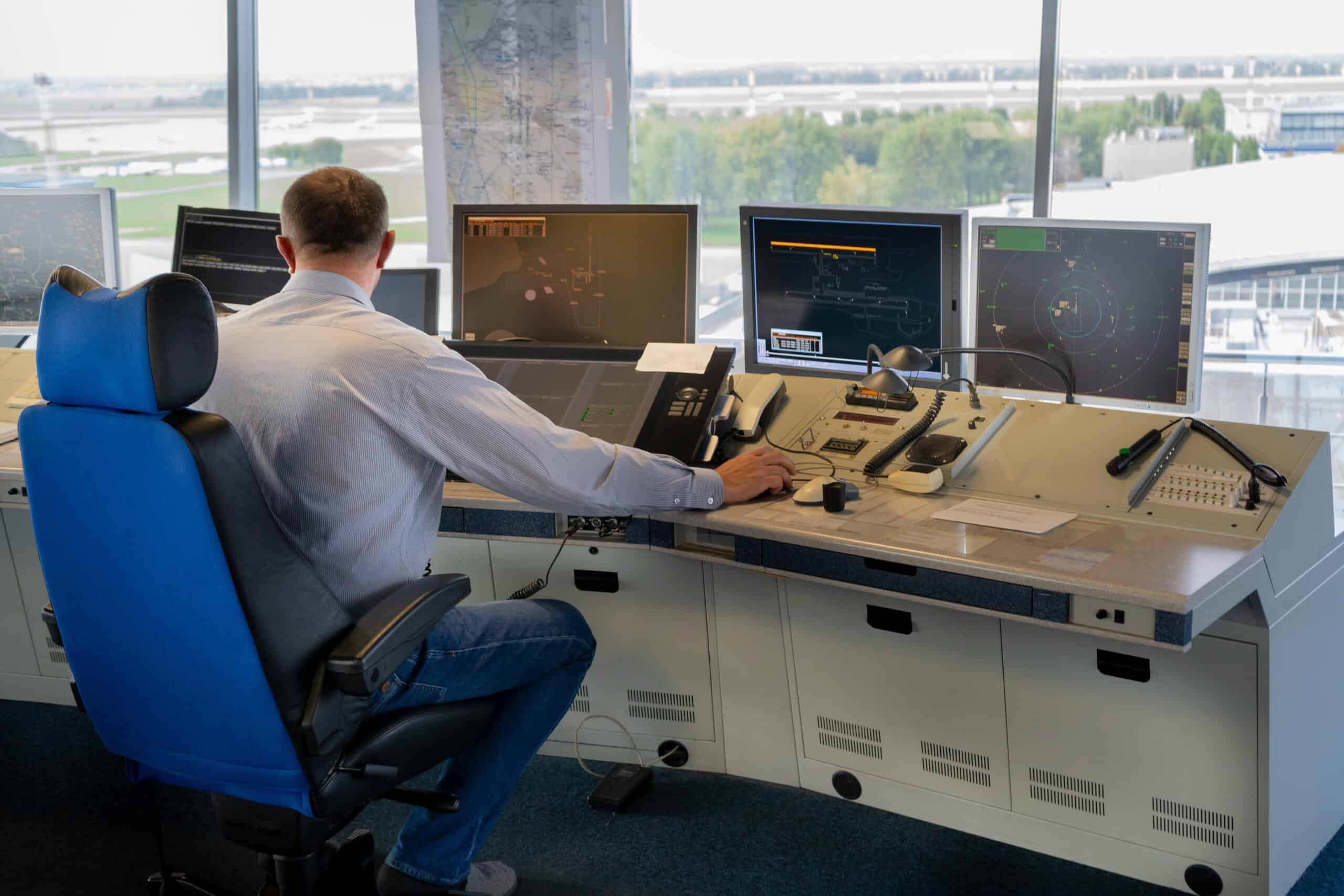 Air traffic controller at radar workstation
