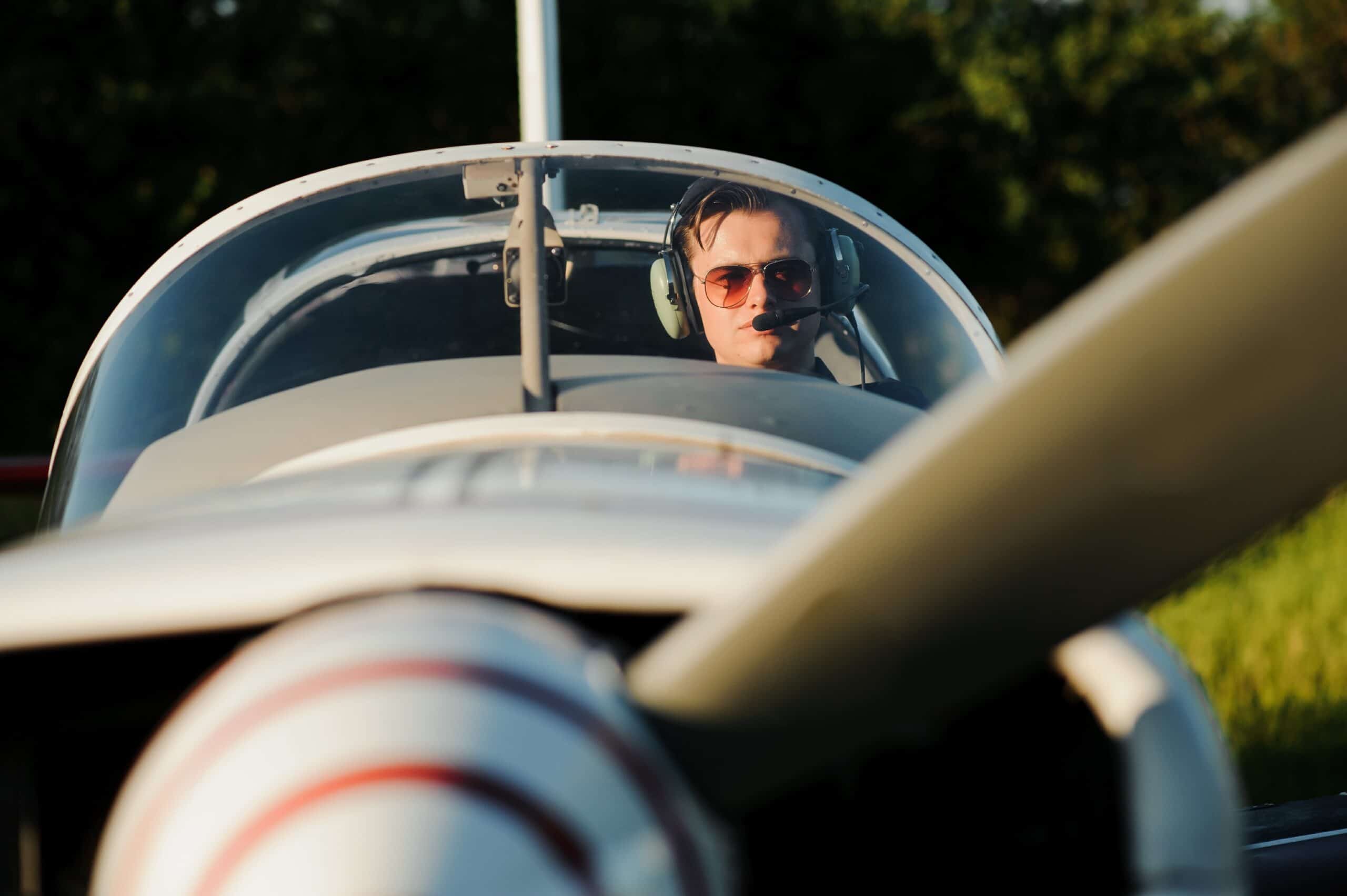 Young GA pilot preparing for takeoff at private airfield