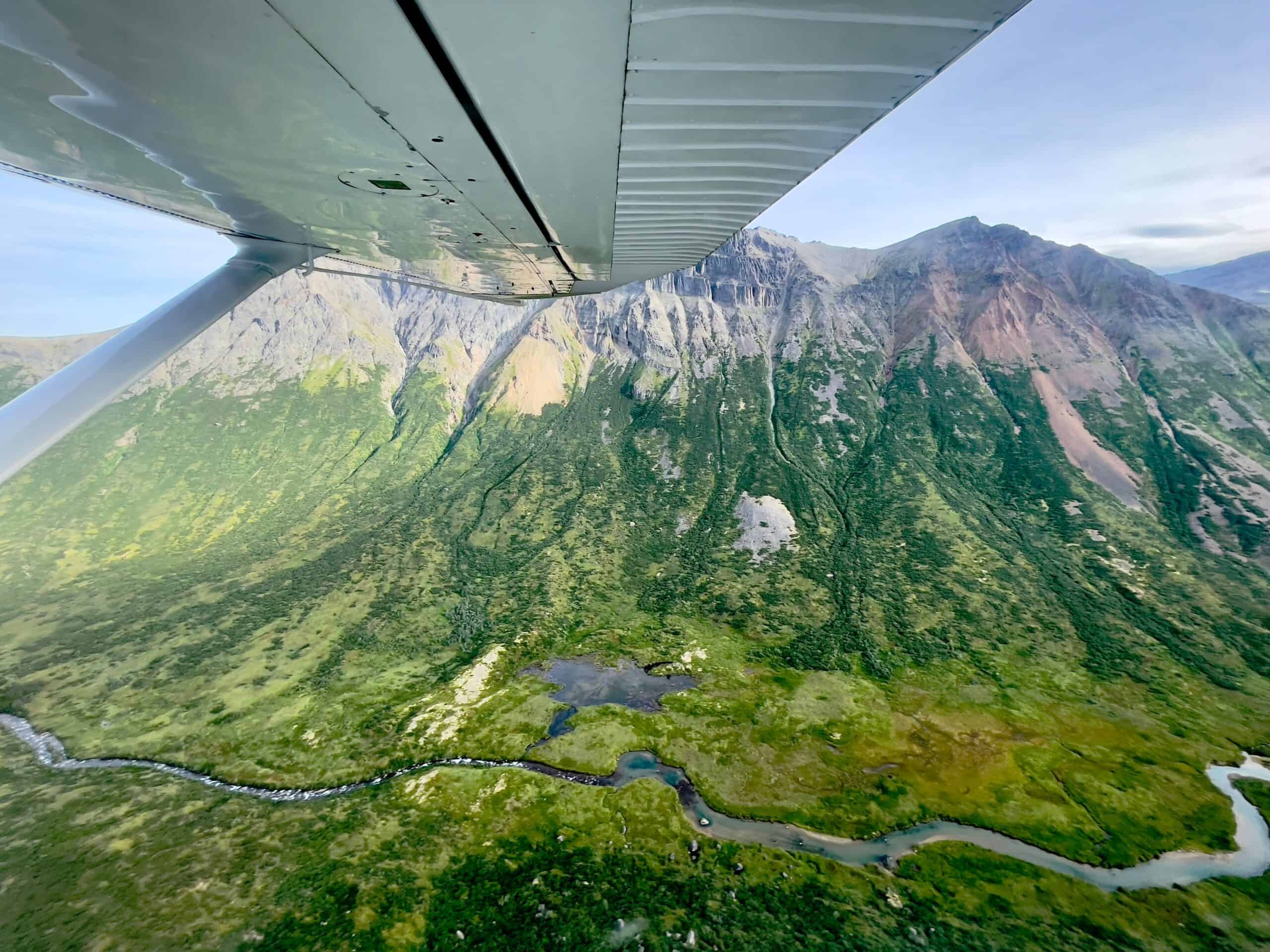 aerial view backcountry flying Alaska wilderness terrain