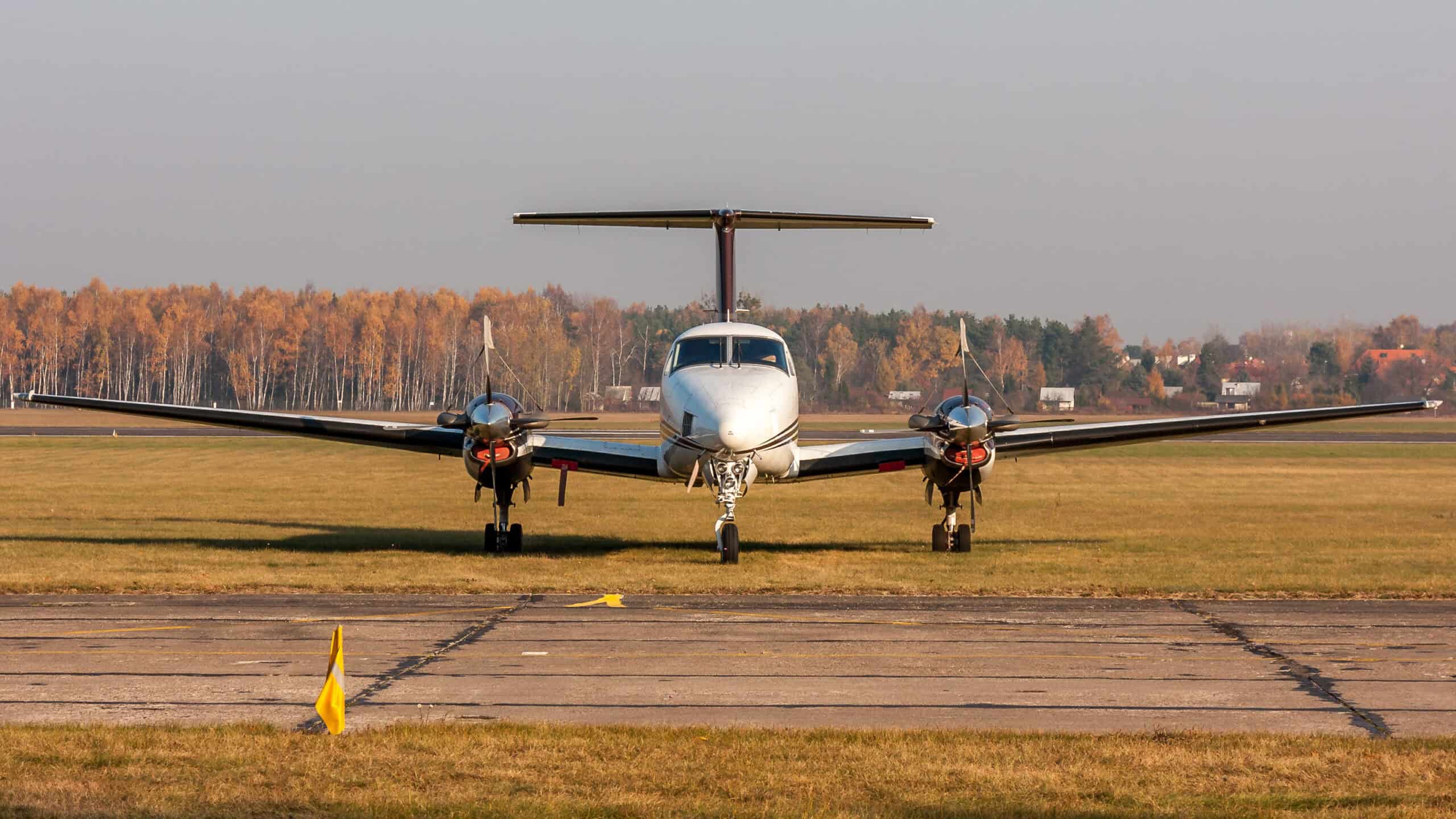 E3 Aviation Association aircraft on runway during daytime.