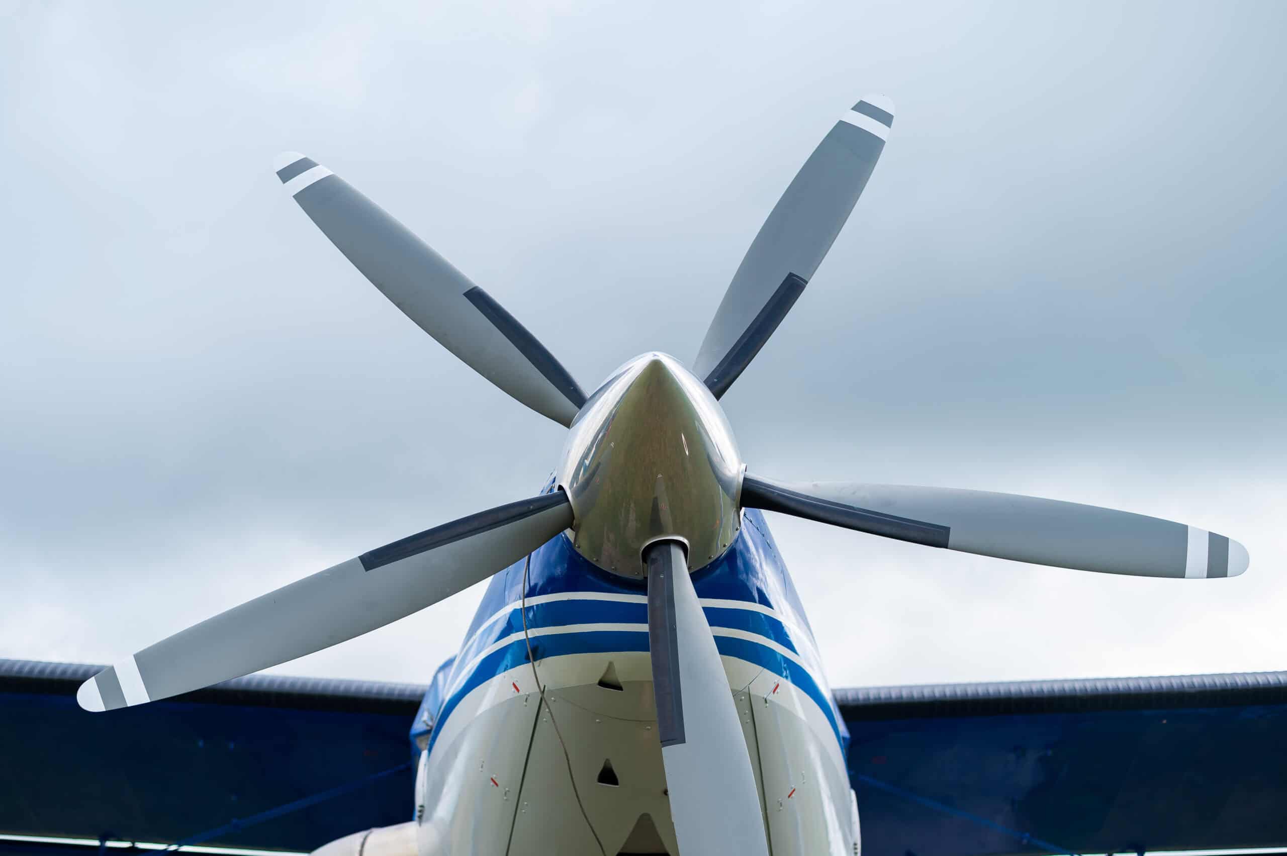 E3 Aviation Association Aviation A propeller aircraft on runway.