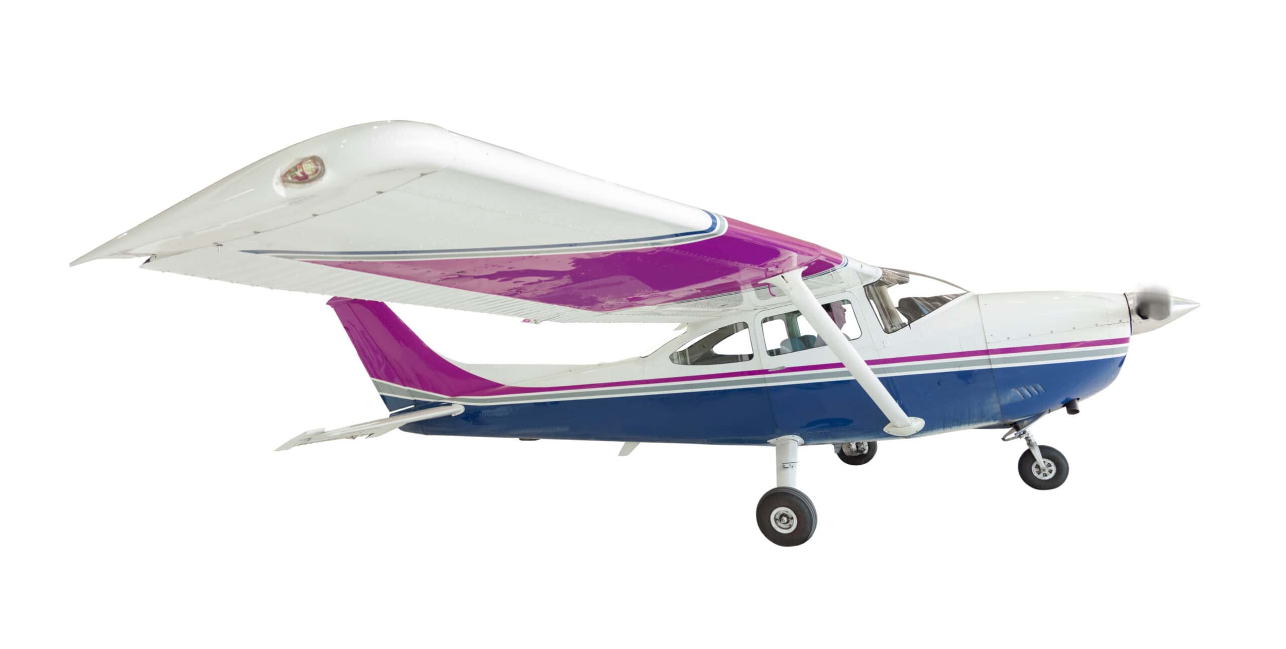 Small aircraft with purple and white exterior, propeller engine, and landing gear.