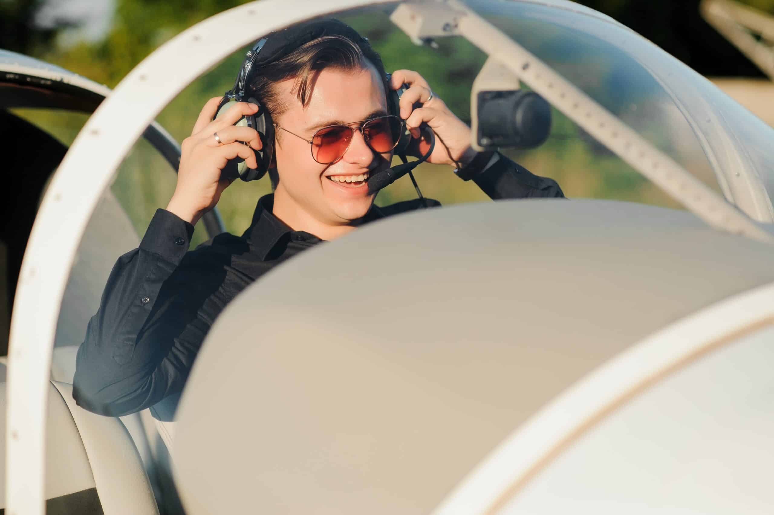 pilot in small plane with aviation camera mount setup