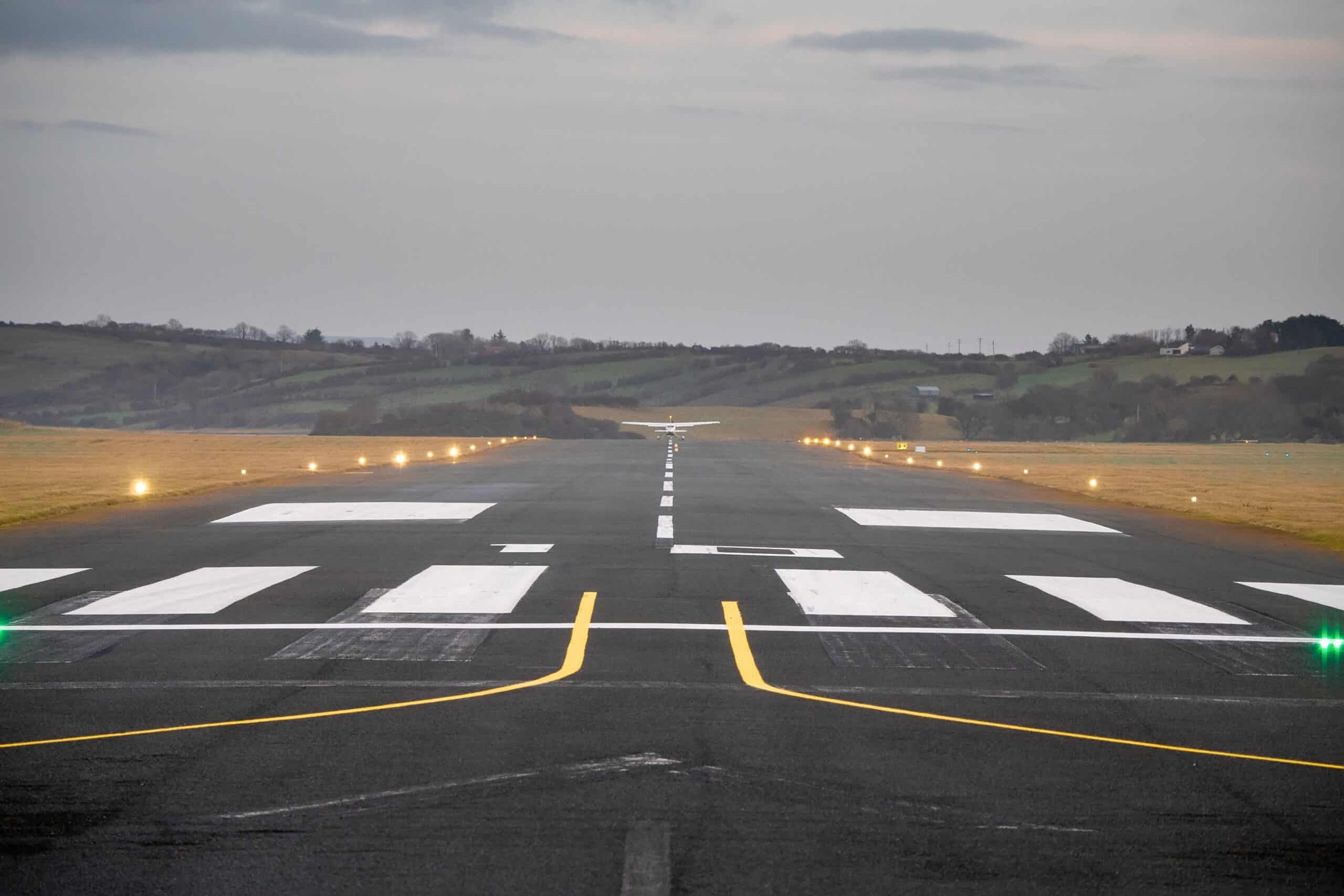 Rural general aviation airport runway showing go-around procedure setup