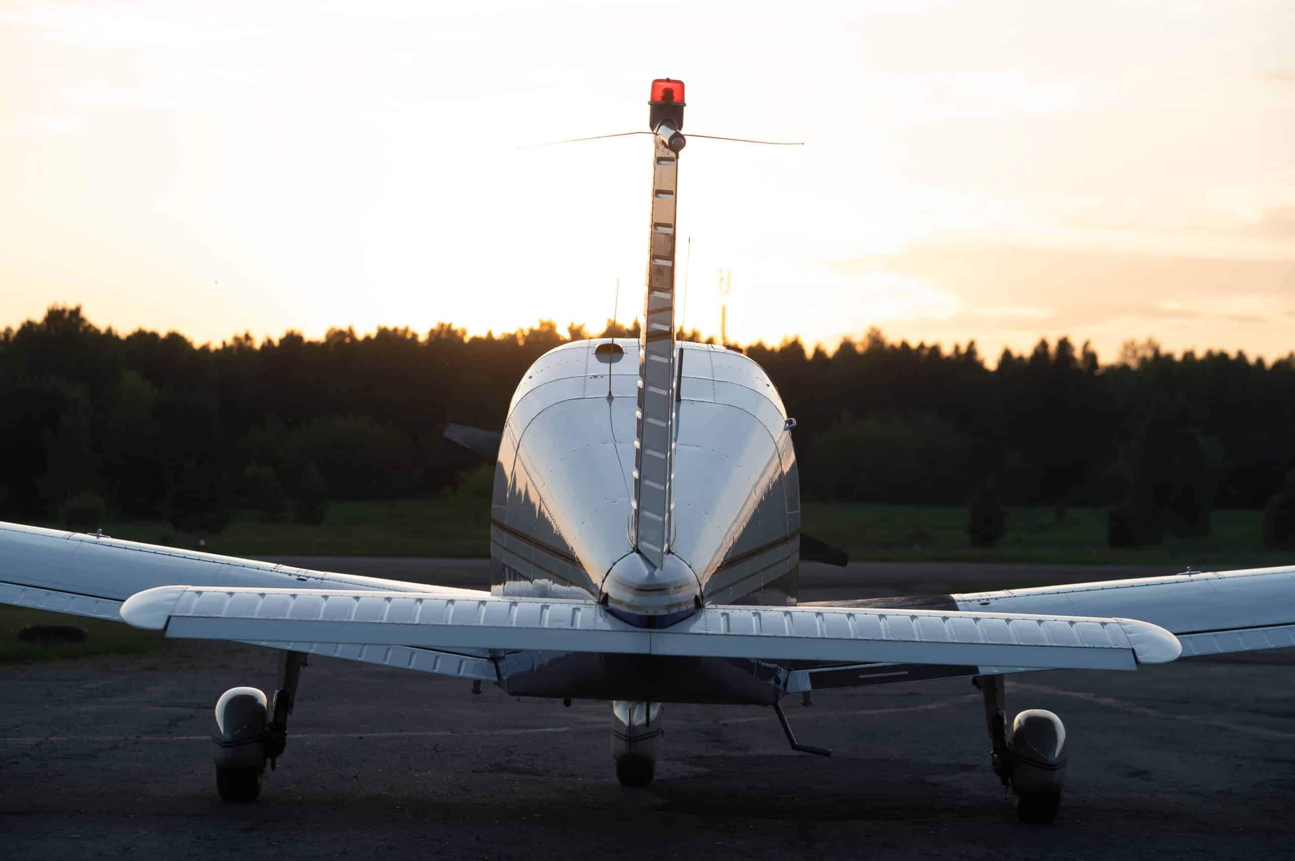 Low-wing GA aircraft on the runway at sunset — loss of control prevention through stabilized approach