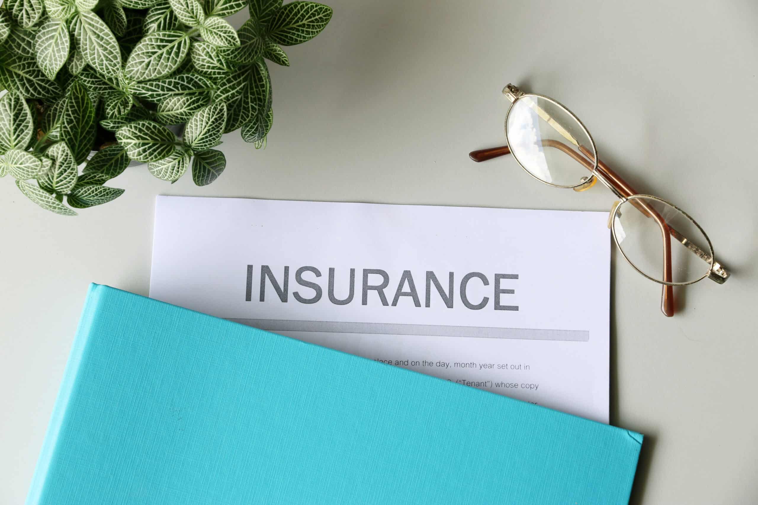 Aviation insurance policy document on desk