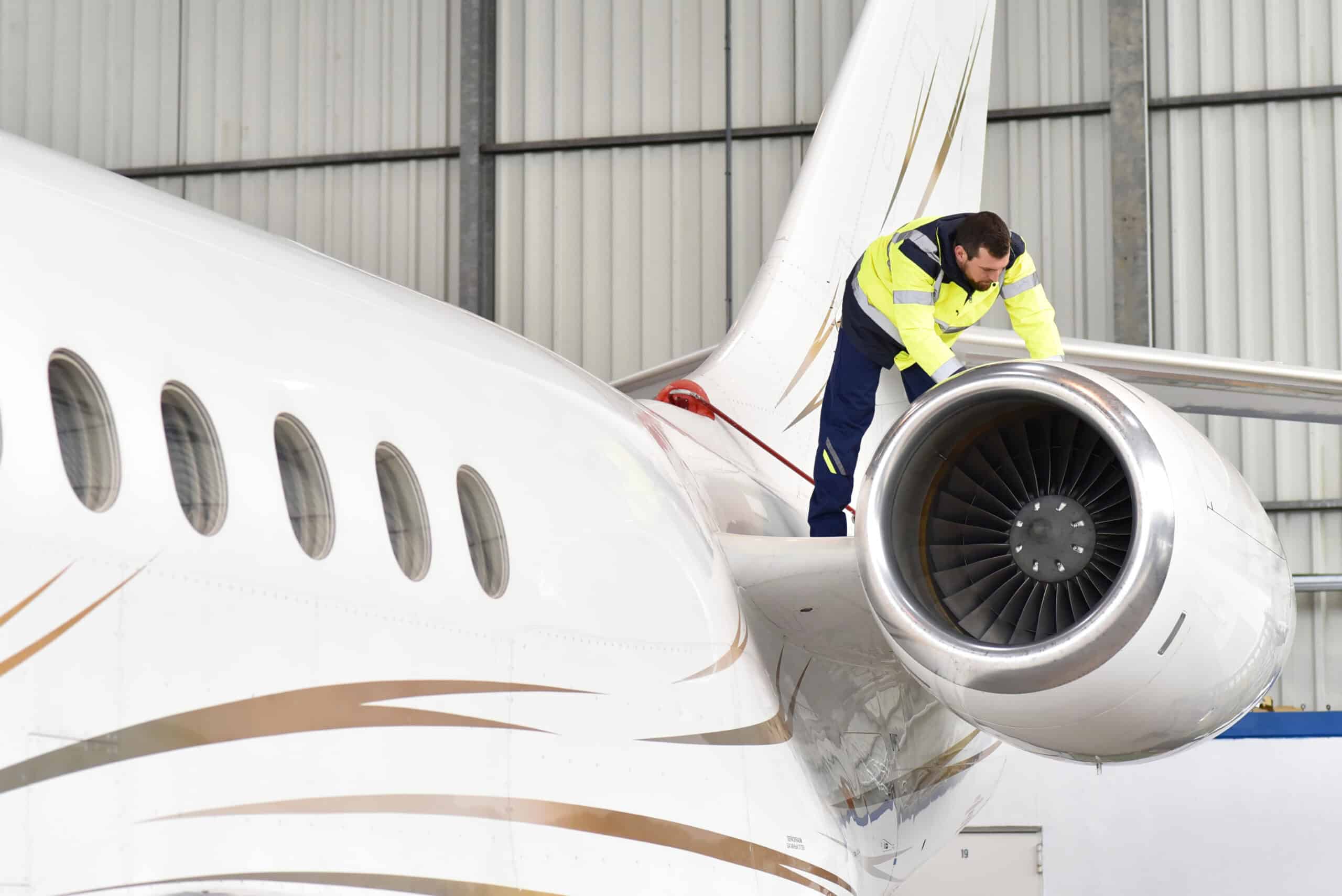 Owner pilot performing preventive maintenance inspection on aircraft
