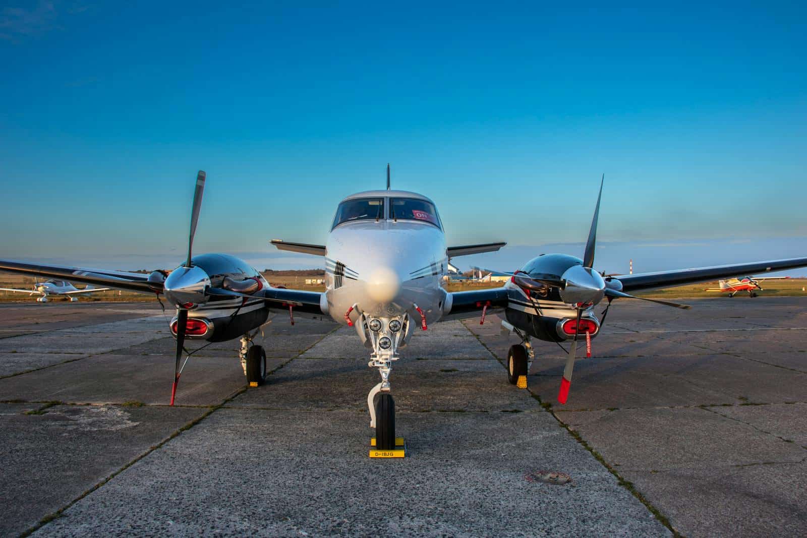 Twin-engine general aviation aircraft on the tarmac