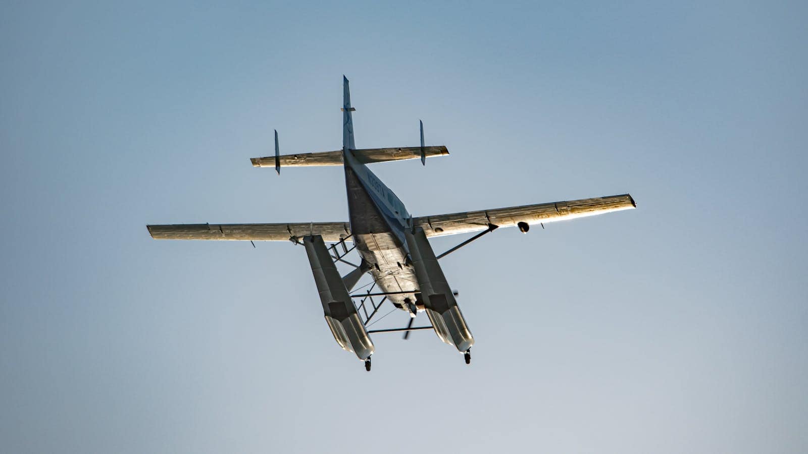 Light aircraft parked off-airport in open terrain
