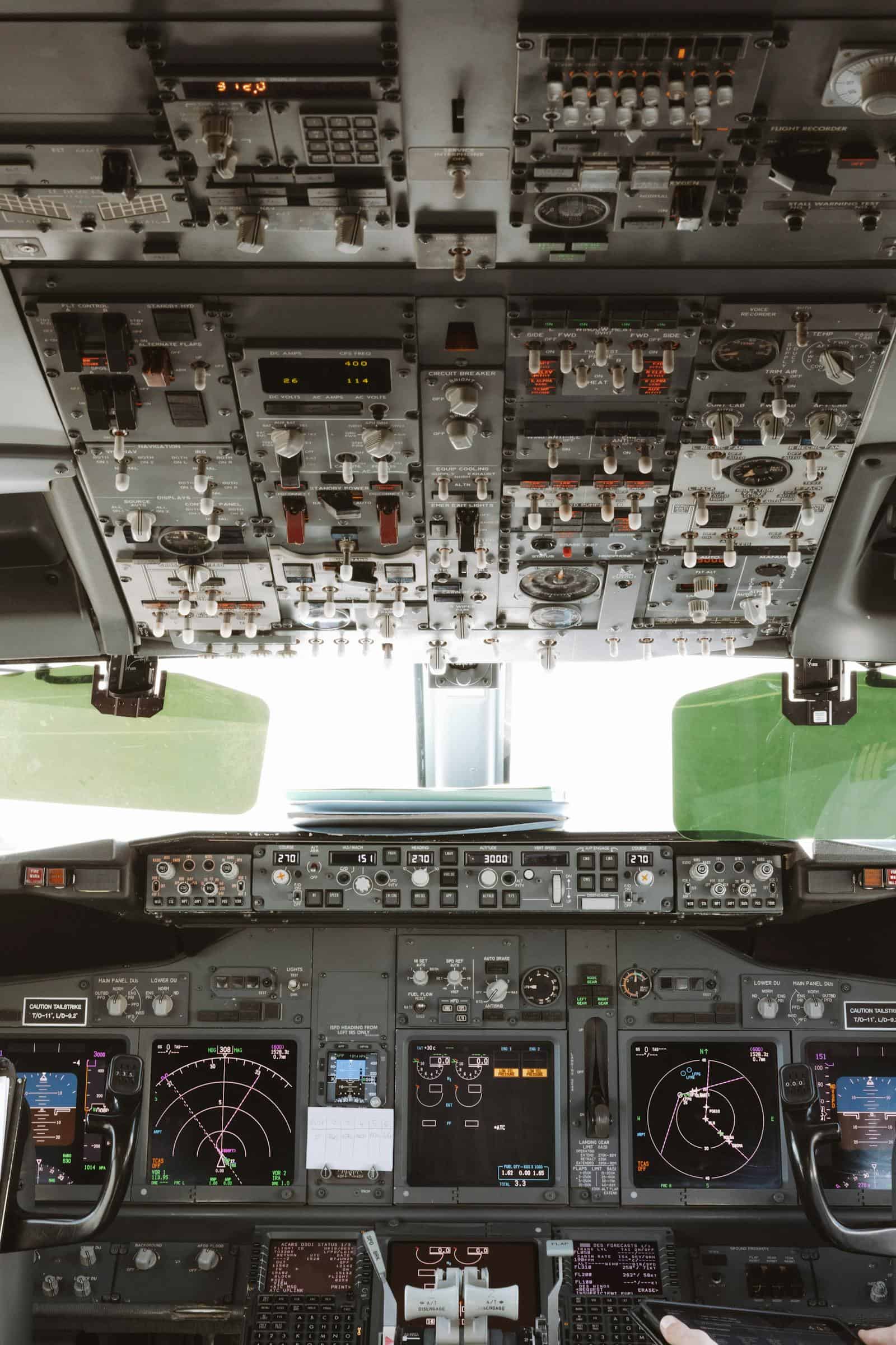Panoramic view of a general aviation cockpit during daylight operations