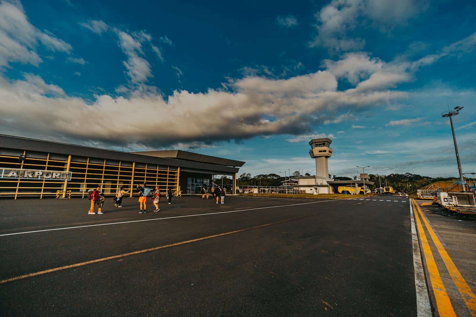 Small general aviation airport terminal under blue skies