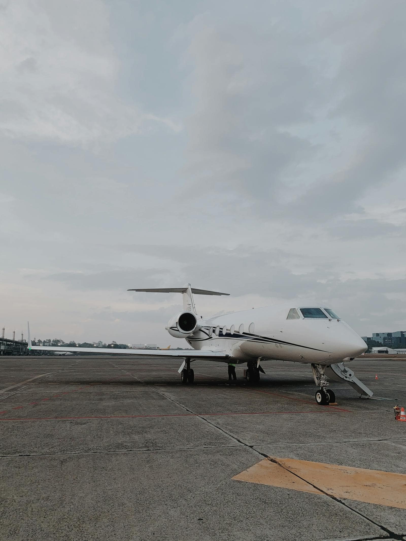 Small private aircraft at an airport tarmac