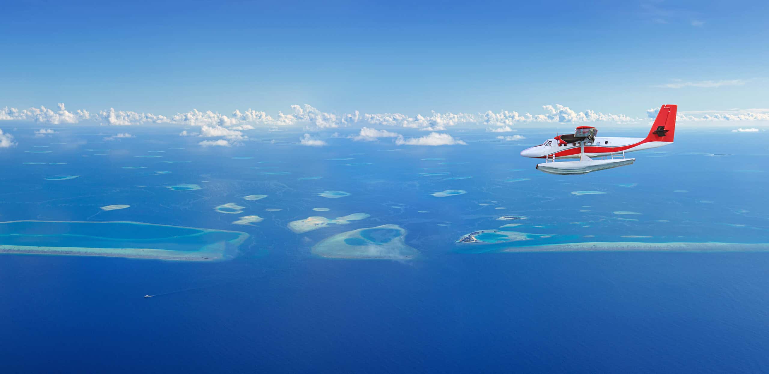 seaplane flying Florida Keys aerial view over tropical island