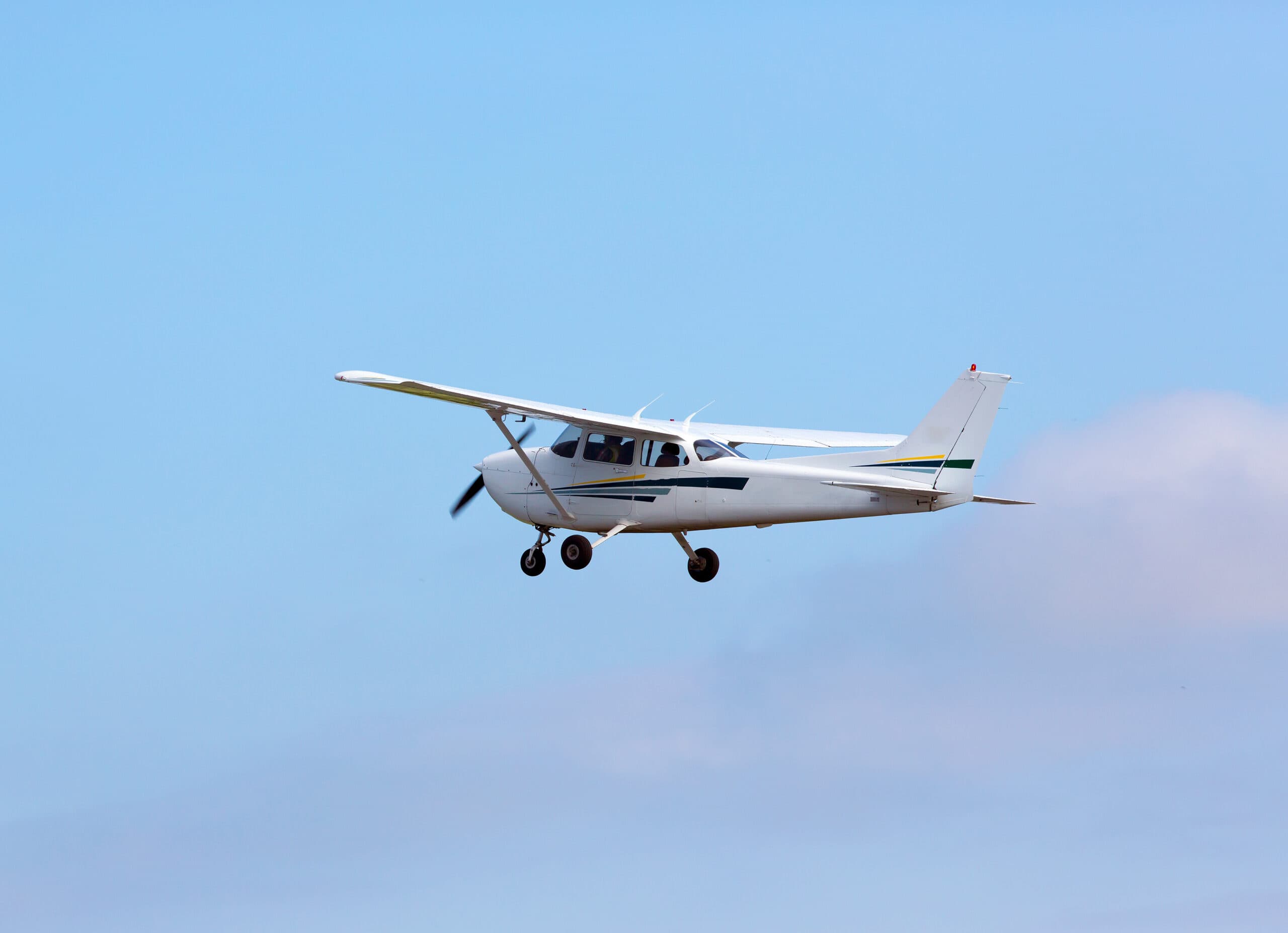 Small general aviation aircraft in slow flight training approach configuration
