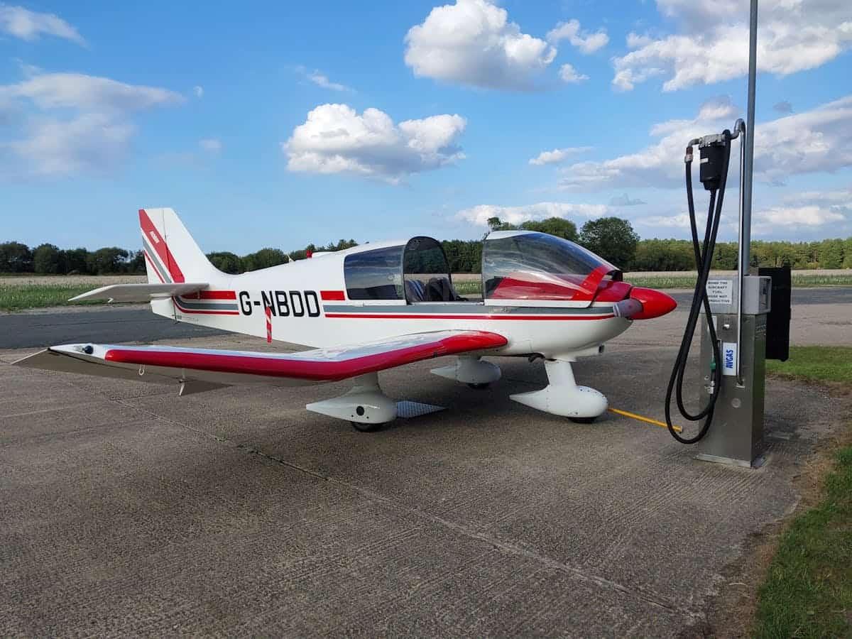 Small GA aircraft at a self-serve fuel station
