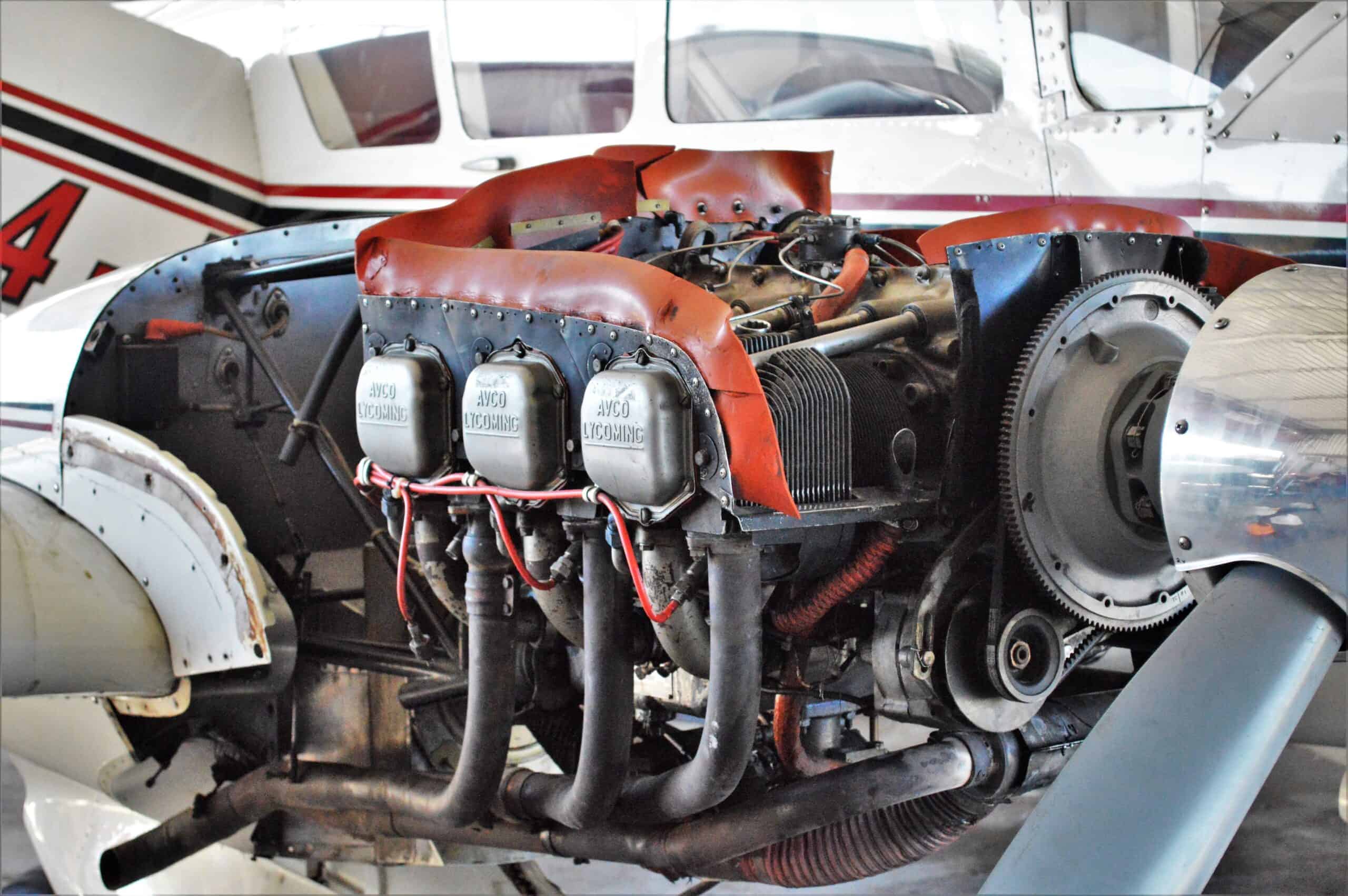 Lycoming GA piston engine cowling open showing where filter inspection during an aircraft engine oil change happens