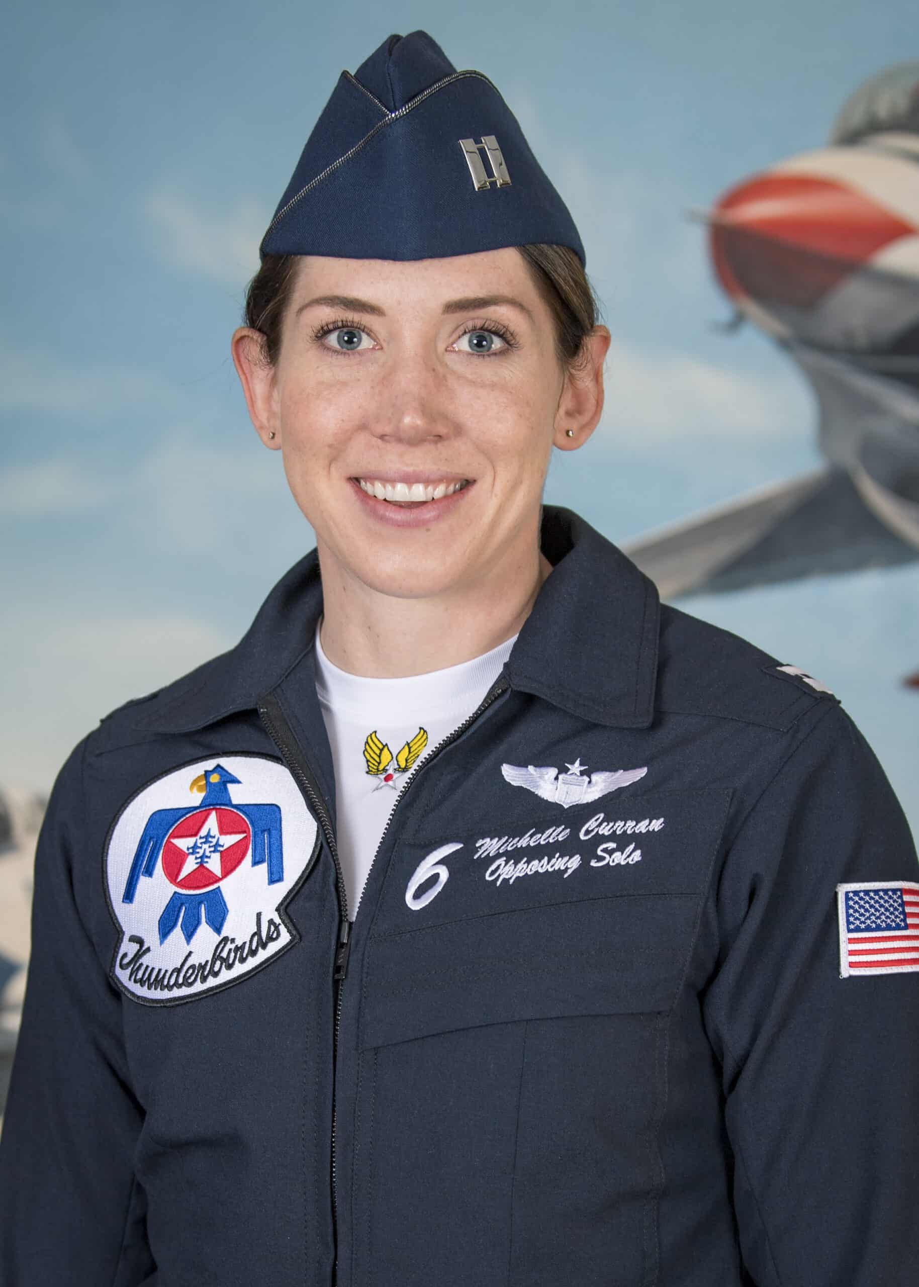 Michelle Curran in Thunderbirds blue G-suit as USAF Opposing Solo — Lane 4 Empowerment ambassador