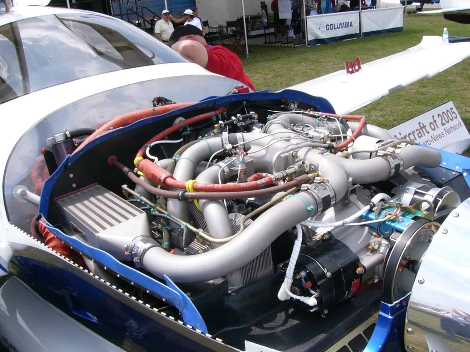 Continental TSIO-550-C piston aircraft engine installed in a Columbia 400 — the belt-driven alternator sits on the accessory case in classic alternator vs generator geometry.