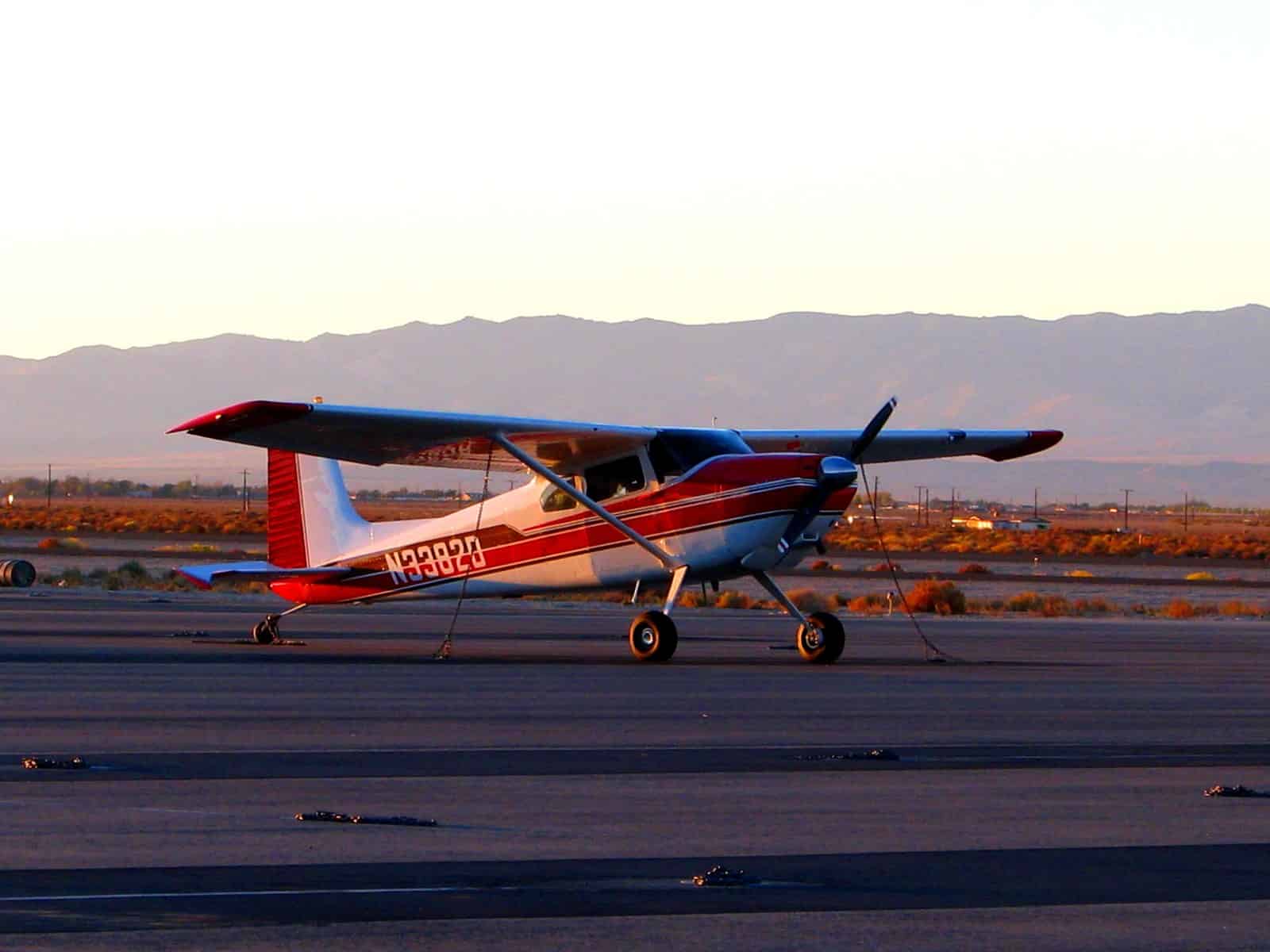 Cessna 180 tied down at a small California airstrip - GA airframe similar to what most West Coast pilots fly through the marine layer fog