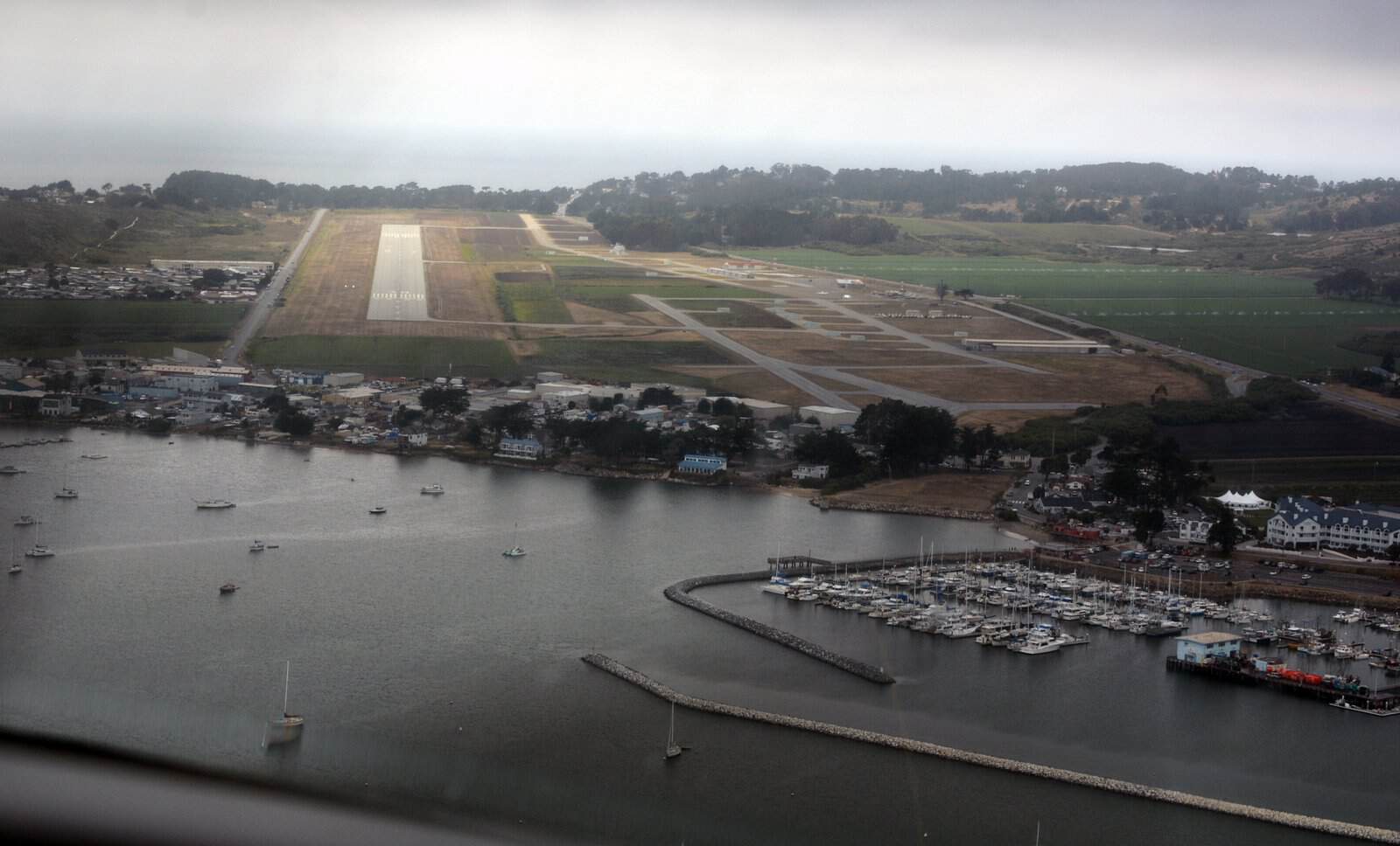 Half Moon Bay Airport (KHAF) - a coastal California GA airport that lives inside the marine layer fog most summer mornings