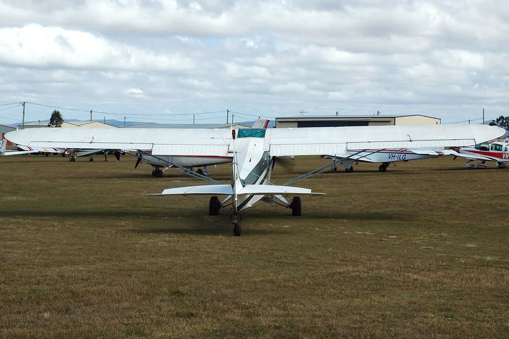 Piper PA-18 Super Cub in flight — the classic Sun Valley Fly-In and Smiley Creek U87 airplane.