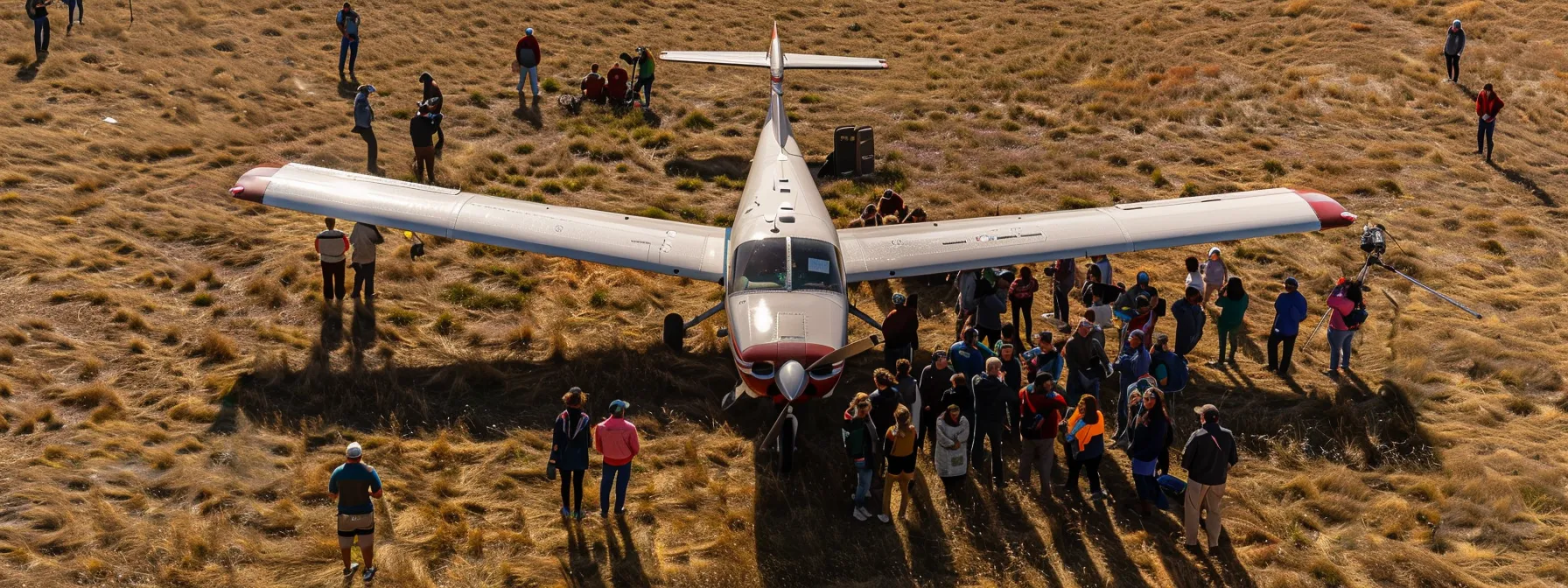 A vibrant gathering of diverse pilots and backcountry aviation enthusiasts networking around a bush plane.